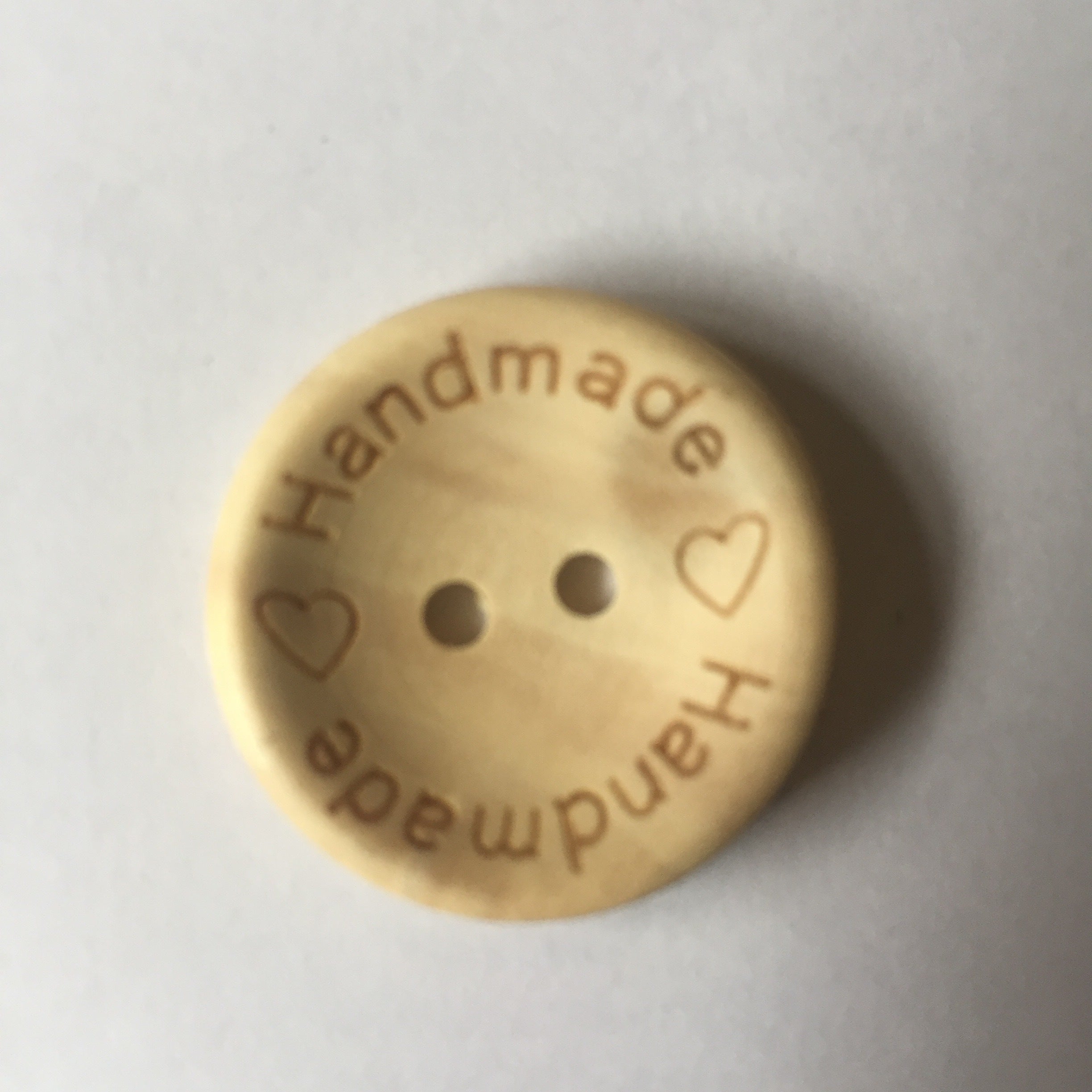 Wooden “Handmade” button