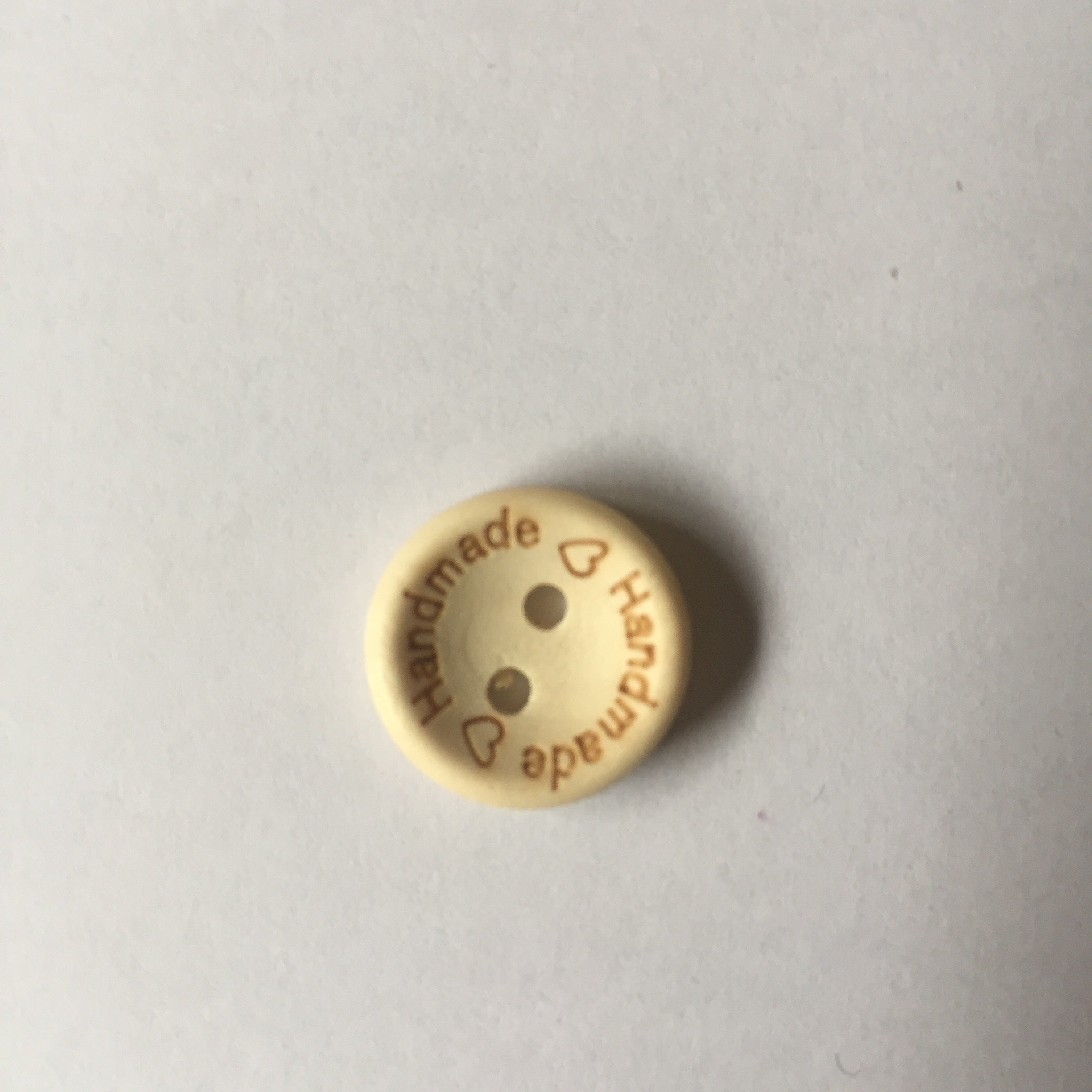 Wooden “Handmade” button