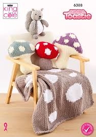 King Cole Pattern 6388 Toadstool Cushions, Door Stop, Blanket and Squirrel Toy knitted in Jumbo Toastie